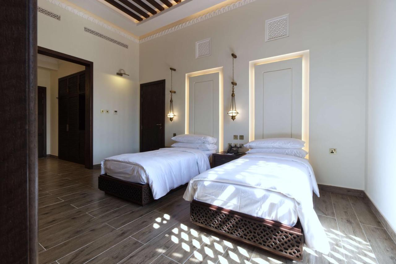Отель Al Badayer Retreat By Sharjah Collection Margham Экстерьер фото A bedroom at the hotel